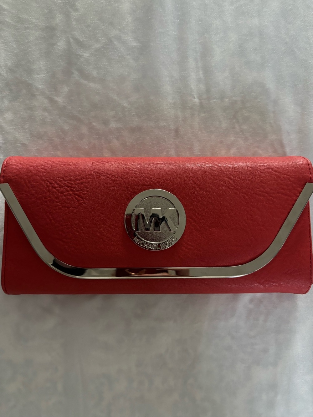 Michael Kors leather clutch with removable wrist and shoulder strap